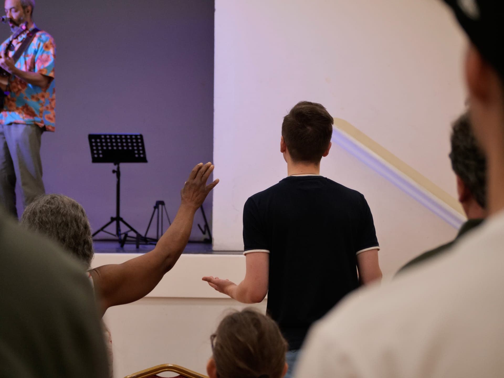 Worship with a hand raised